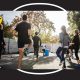Colleagues warming up for a run outside